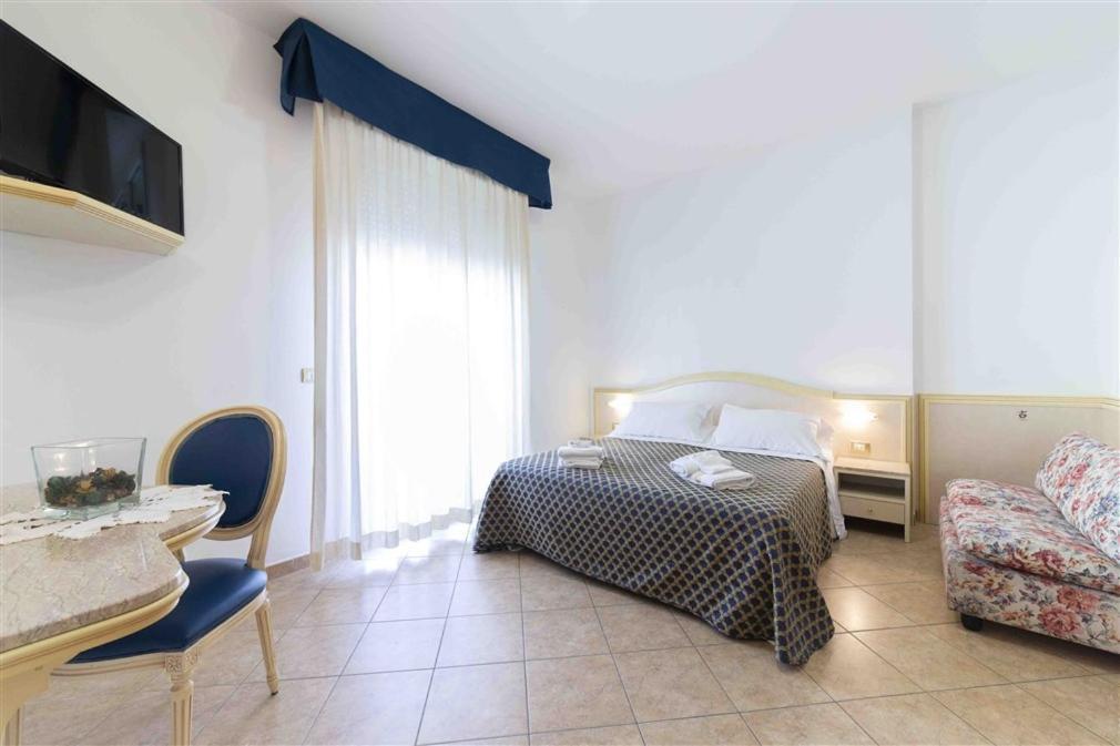 Residenza Melucci Aparthotel Rimini Buitenkant foto